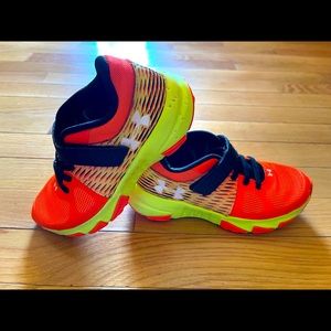 Very bright, very nice pair of Under Armour kids size 12 shoes.